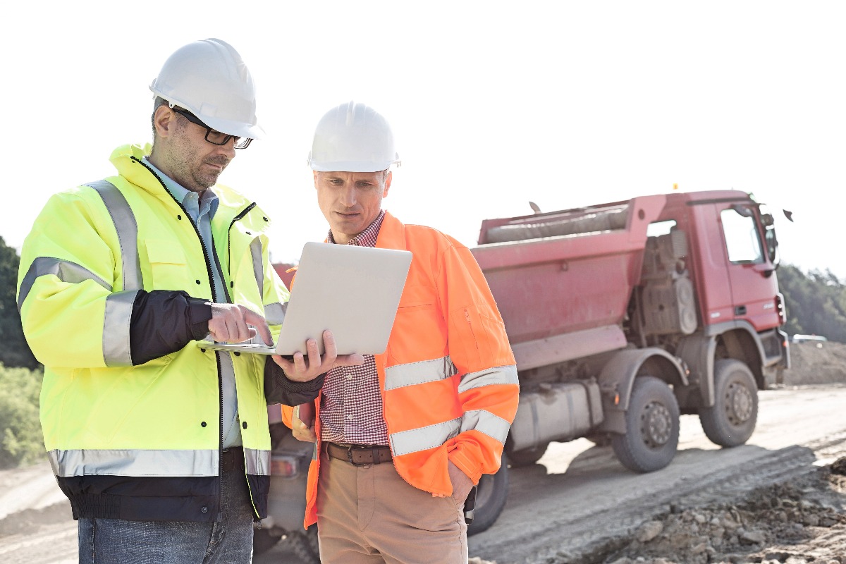 contractors using a laptop