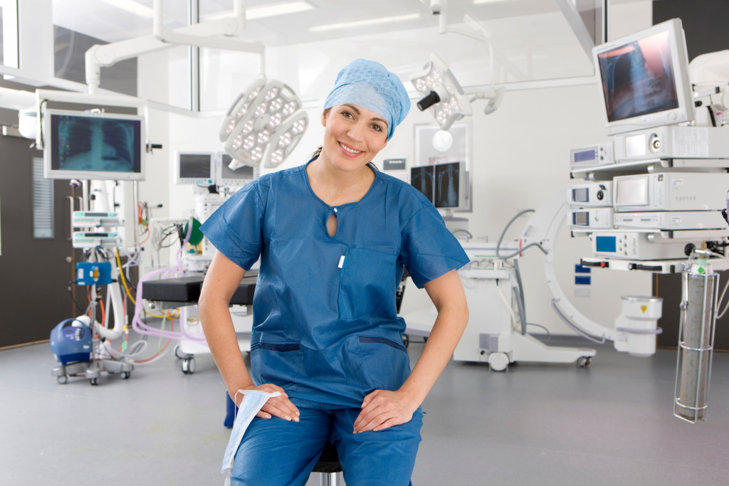 female surgeon sitting in an advanced operating room