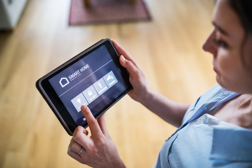 Holding a tablet used for smart home